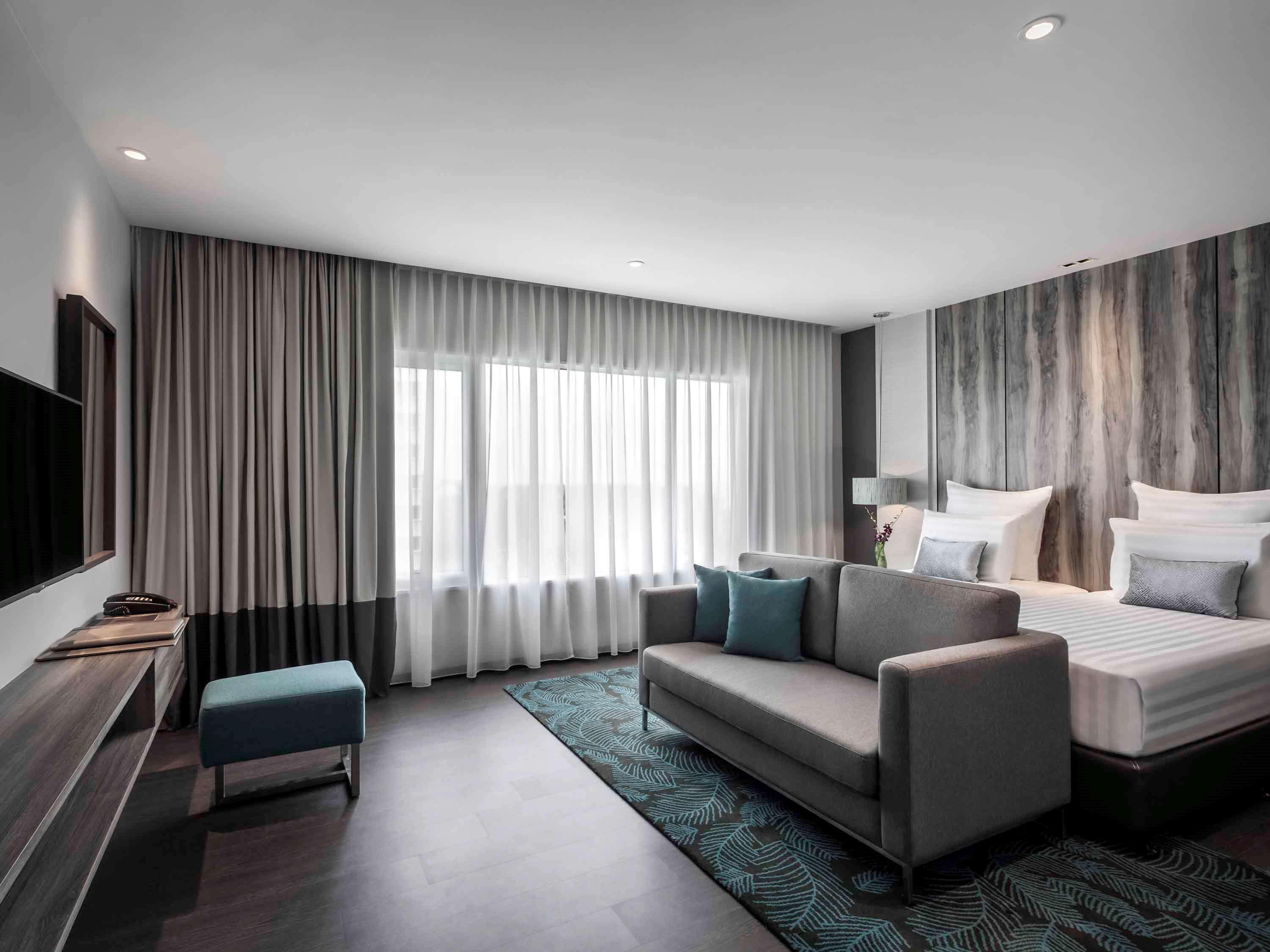 Pullman Miri Waterfront Hotel Exterior photo Deluxe Room