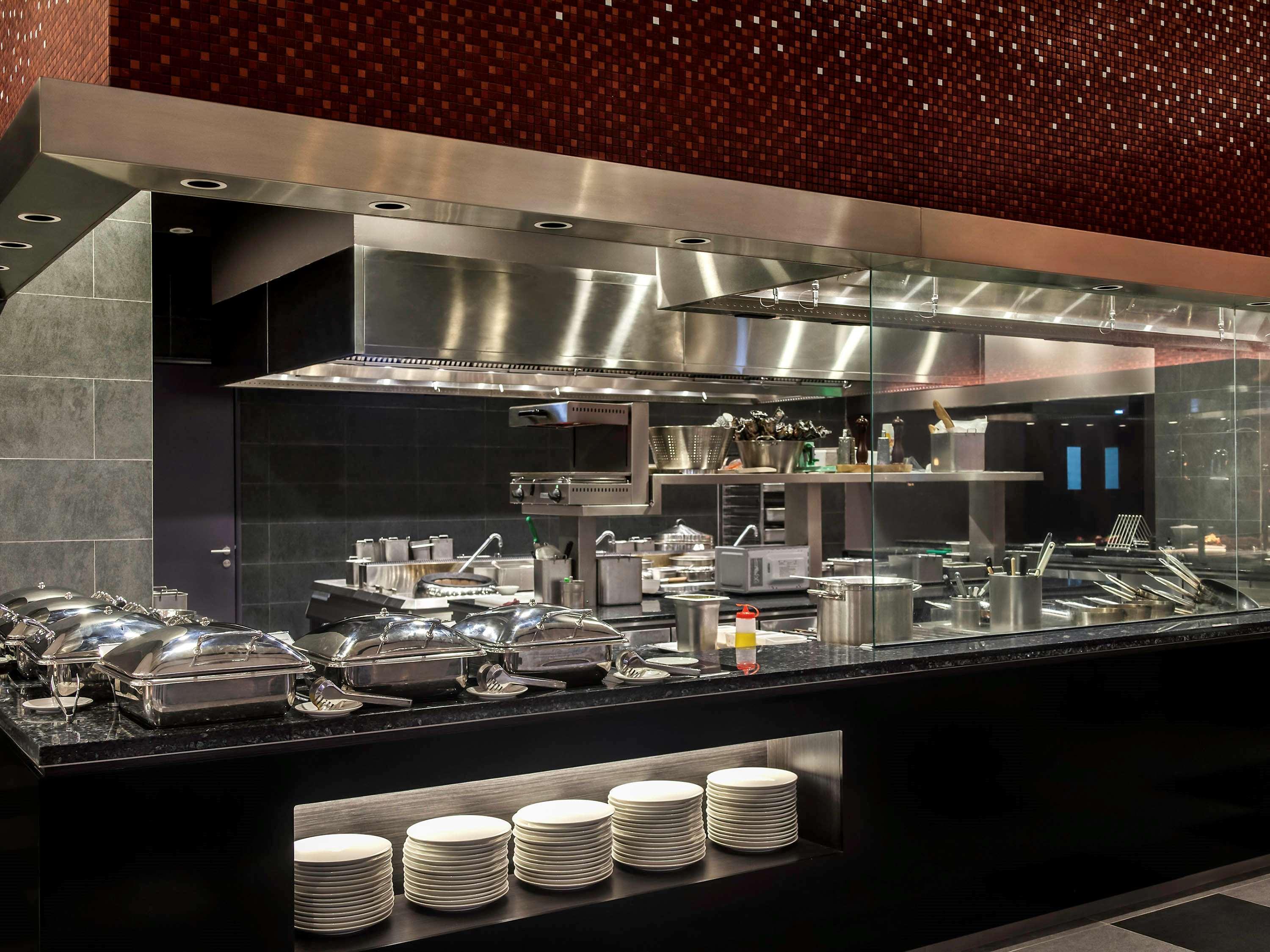 Pullman Miri Waterfront Hotel Exterior photo A buffet at a restaurant