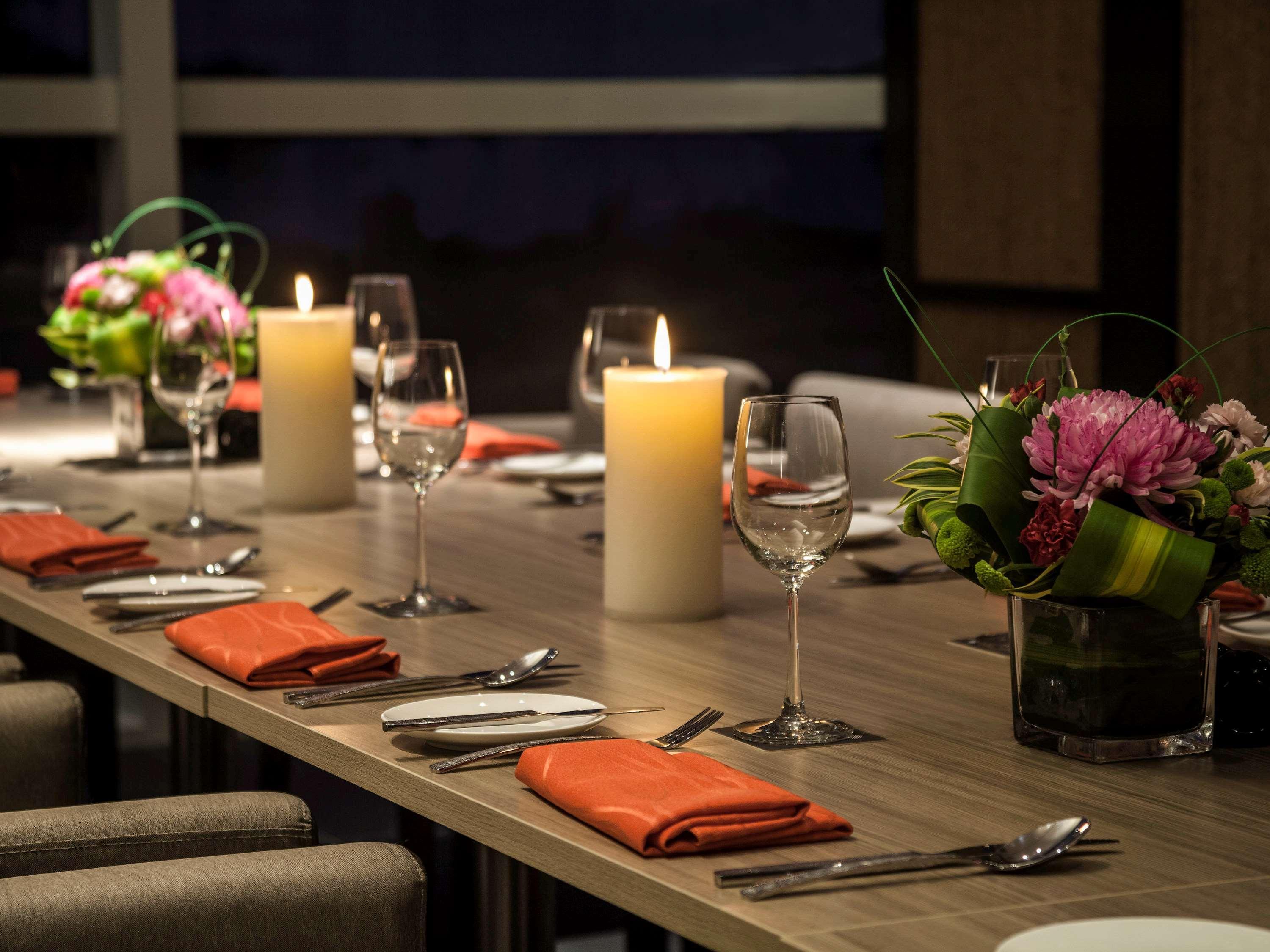 Pullman Miri Waterfront Hotel Exterior photo A table set for a meal