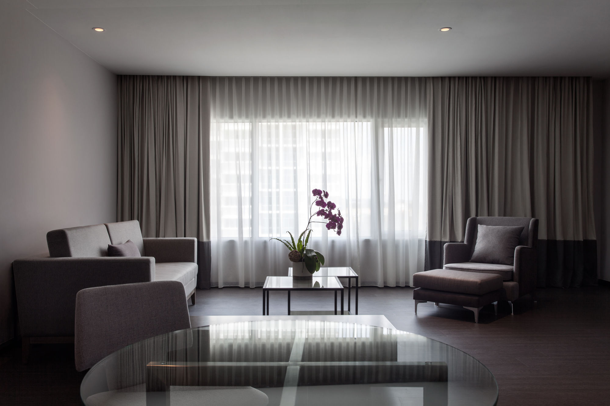 Pullman Miri Waterfront Hotel Exterior photo A living room with curtains