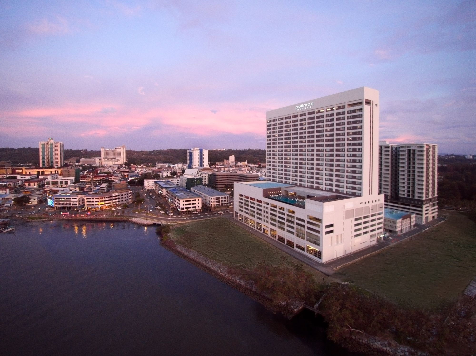 Pullman Miri Waterfront Hotel Exterior photo The Riverfront